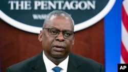 FILE - Secretary of Defense Lloyd Austin speaks at a virtual Ukraine Defense Contact Group meeting, Nov. 22, 2023, at the Pentagon. Austin has been released from the hospital where he was treated for complications from surgery for prostate cancer.