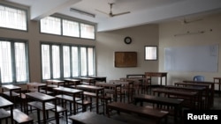 FILE - An empty classroom of a school named Udayan Uchcha Madhyamik Bidyalaya, is pictured as all schools are closed due to on going heatwave in Dhaka, Bangladesh, April 25, 2024.