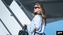 FILE - Hope Hicks, former aide to President Trump, boards Air Force One at Wilkes-Barre Scranton International Airport, Aug. 20, 2020, in Avoca, Pa.