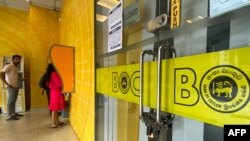 FILE - A branch of the state-owned Bank of Ceylon (BOC) is seen padlocked and shut in Colombo, Sri Lanka, March 1, 2023, amid a strike to protest high taxes.