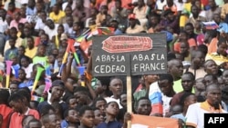 Tens of thousands rally in Niamey to show support for the military leaders behind last month's coup, Aug. 26, 2023.