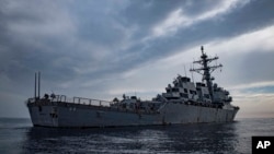 FILE - This image provided by the US Navy shows the USS Carney in the Mediterranean Sea on Oct. 23, 2018. 