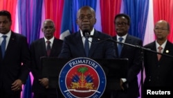 Perdana Menteri sementara baru Haiti Michel Patrick Boisvert berpidato di depan hadirin setelah dewan transisi mengambil alih kekuasaan dengan tujuan mengembalikan stabilitas negara, Haiti, 25 April 2024. (Foto: REUTERS/Pedro Valtierra)
