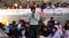 FILE - Bajrang Punia, Indian wrestler who won a Bronze medal at the 2020 Tokyo Olympics, addresses the media during a protest against Wrestling Federation of India President Brijbhushan Sharan Singh and other officials in New Delhi, India, Jan. 20, 2023. 