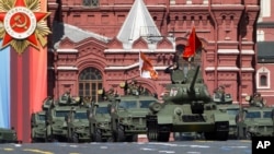A Soviet-era E-34 tank leads the column of Russian armored vehicles in Red Square during the Victory Day military parade in Moscow, May 9, 2023, marking the 78th anniversary of the end of World War II.
