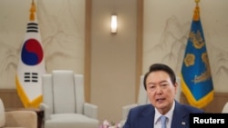 FILE - South Korean President Yoon Suk-yeol speaks at an interview with Reuters in Seoul, South Korea, Nov.r 28, 2022.