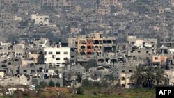 ছবিতে গাজা ভূখণ্ডে ধ্বংসপ্রাপ্ত ভবনগুলো দেখা যাচ্ছে। (৬ মার্চ, ২০২৪)