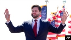 FILE - Sen. J.D. Vance attends a campaign rally in Vandalia, Ohio, March 16, 2024.