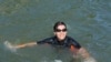 Paris mayor takes pre-Olympics dip to prove Seine clean