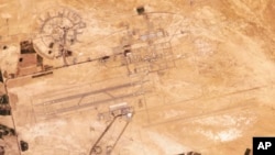 This satellite image from Planet Labs PBC shows the dual-use civilian airport and air base in Isfahan, Iran, April 18, 2024.