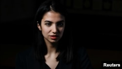Iranian chess player Sarasadat Khademalsharieh, 25, better known as Sara Khadem looks on during an interview with Reuters in southern Spain, Feb. 15, 2023. 