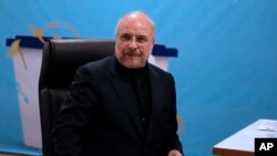 Iran's hard-line parliament speaker Mohammad Bagher Qalibaf registers his name as a candidate for the June 28 presidential election at the Interior Ministry, in Tehran, June 3, 2024. 