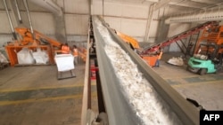 Smashed solar pannels are ictured at the We Recycle Solar plant in Yuma, Arizona, Dec. 6, 2023.