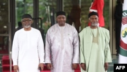 Chief of Staff to Nigerian President, Femi Gbajabiamila (L), Gambia President, Adama Barrow and Nigerian Minister of Foreign Affairs Yussuf Tuggar during the ordinary session of ECOWAS Heads of State and Government in Abuja, July 7, 2024. 