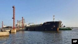 FILE - In this photo released by Karachi Port Trust, a Russian ship carrying oil is anchored at a port in Karachi, Pakistan, June 11, 2023.