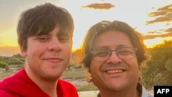 This undated handout from the Dawood Hercules Corporation released June 20, 2023, shows businessman Shahzada Dawood, vice chairman of Karachi-headquartered conglomerate Engro, and his son Suleman.