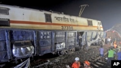 Rescuers work at the site of passenger trains accident, in Balasore district, in the eastern Indian state of Orissa, June 3, 2023.