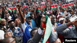 People react during a concert organized in memory of dozens of demonstrators killed during tax hike protests, in Nairobi, Kenya, July 7, 2024.