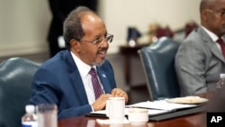 Somali President Hassan Sheikh Mohamud speaks during a meeting with Defense Secretary Lloyd Austin at the Pentagon, June 21, 2023, in Washington. The following day in New York, he urged the U.N. Security Council to lift an arms embargo on his nation.