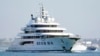 FILE - The superyacht Amadea sails into San Diego Bay, June 27, 2022, as seen from Coronado, California. The U.S. wants to sell the confiscated vessel, which it says belongs to a sanctioned Russian oligarch.