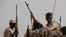 Sudanese soldiers from the Rapid Support Forces unit, led by Gen. Mohammed Hamdan Dagalo, the deputy head of the military council, secure the area where Dagalo attends a military-backed tribe's rally, in the East Nile province, Sudan. (Hussein Malla/AP Photo)
