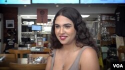 Ketrin Garcia, from Venezuela, is the assistant general manager at Immigrant Food’s White House location. (Screen grab from video by Saqib Ul Islam/VOA)