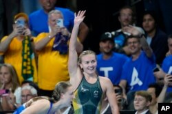 Ariarne Titmus of Australia celebrates after winning the women's 400-meter freestyle final at the 2024 Summer Olympics in Nanterre, France, July 27, 2024.