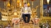 Thai King Maha Vajiralongkorn sits during a ceremony to celebrate his 71st birthday at the Grand Palace in Bangkok, Thailand, July 28, 2023. 