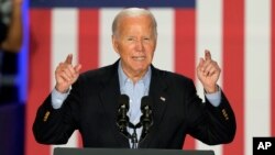 U.S. President Joe Biden speaks at a campaign rally at Sherman Middle School in Madison, Wisconsin, July 5, 2024. 