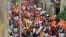 Devotees take part in a religious procession to celebrate the annual Hindu festival of Ram Navami in Ahmedabad on March 30, 2023.
