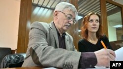 Oleg Orlov, co-chair of the Nobel Prize-winning Russian human rights organization Memorial, accused of repeatedly discrediting the Russian army, appears in court in Moscow, Oct. 11, 2023.
