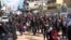 Протести во деловите од Сирија каде што владеат бунтовниците