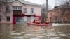 Russians stage rare protest after unprecedented floods engulf Ural region 