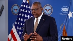 FILE - U.S. Defense Secretary Lloyd Austin speaks at a news conference at the Pentagon near Washington, March 15, 2023. The Defense Department on July 5, 2023, released results of its 45-day review of the leak of classified documents earlier this year. 