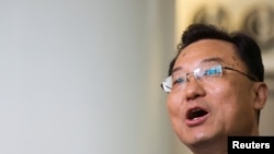 FILE - Xie Feng, China's ambassador to the United States, addresses the media at John F. Kennedy International Airport in New York, May 23, 2023. 