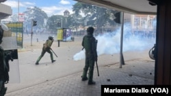 Police use tear gas to confront protesters in Nairobi, Kenya, on June 25, 2024.