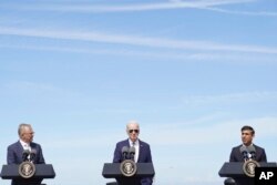 Britain's Prime Minister Rishi Sunak, right, meets with U.S. President Joe Biden and Prime Minister of Australia Anthony Albanese, left, at Point Loma naval base in San Diego, March 13, 2023.