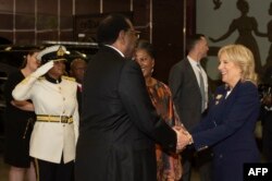 U.S. first lady Jill Biden is welcomed by Namibian President Hage Geingob at the State House in Windhoek, Feb. 23, 2023.
