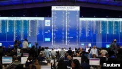 Le tableau des résultats au Centre national d'opérations des résultats de la Commission électorale d'Afrique du Sud à Midrand, en Afrique du Sud, le 30 mai 2024.