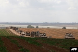 Izreelska vona vozila kreću se u blizini granice sa Pojasom Gaze, 12. maja 2024.