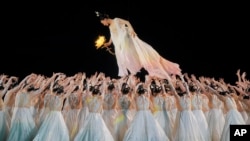 Artists perform during the closing ceremony of the 19th Asian Games in Hangzhou, China, Oct. 8, 2023. 