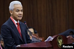 Ganjar Pranowo, calon presiden dari Partai Demokrasi Indonesia Perjuangan (PDI-P) yang berkuasa, dalam sidang gugatan hukum terhadap hasil pemilu bulan lalu, di Mahkamah Konstitusi di Jakarta, 27 Maret 2024. (REUTERS/Ajeng Dinar Ulfiana)