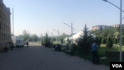 FILE - Kyrgyz police guard the campus of Osh State University's medical center where hundreds of students from South Asia pursue medical degrees, photo taken on May 24, 2024, Osh, Kyrgyzstan.