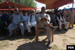 Locals listen to the former Chief Minister of Jammu and Kashmir at an election rally organized by his party, the National Conference, in the Palpora area of Srinagar. (Credit: Wasim Nabi for VOA)