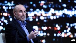 Hard-line presidential candidate Mohammad Bagher Qalibaf, who is Iran's Parliament speaker, speaks in a debate of the candidates at the TV studio in Tehran, Iran, June 17, 2024, in this picture made available by Iranian state-run TV, IRIB.