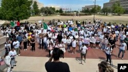 Oklahoma City immigration attorney Sam Wargin Grimaldo speaks to a group outside the Oklahoma Capitol on April 23, 2024.