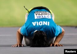 India's Neeraj Chopra celebrates winning gold in the men's javelin throw at the World Athletics Championship, Budapest, Hungary, Aug. 27, 2023.