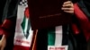 Small pro-Palestinian protests emerge at US college commencements 