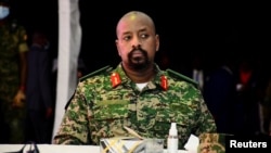 FILE - Lt. General Muhoozi Kainerugaba, the son of Uganda's President Yoweri Museveni, attends an event in Entebbe, Uganda, May 7, 2022. 