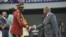 FILE - Gabon Transitional President General Brice Oligui Nguema, left, shakes hands with the President of the Central African Republic Faustin-Archange Touadera at the opening of the National Dialogue in Gabon in Libreville, April 2, 2024. 